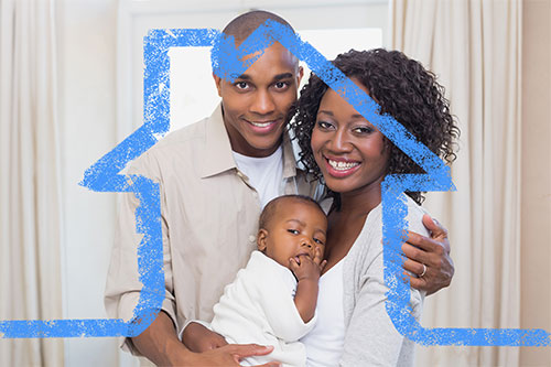 Happy young family behind blue outline of a house
